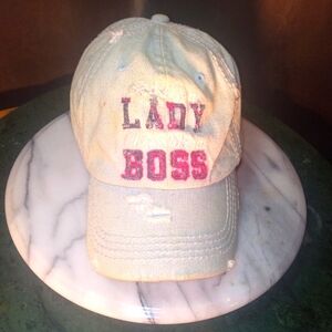 LADY BOSS, distressed white hat with pink letters.  Velcro strap adjustable